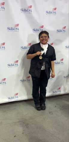 Adly with her gold medal at SkillsUSA Maryland.
