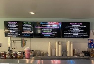 Menu wall at Brrrr Ice Cream, Shakes & Crepes in Solomons.